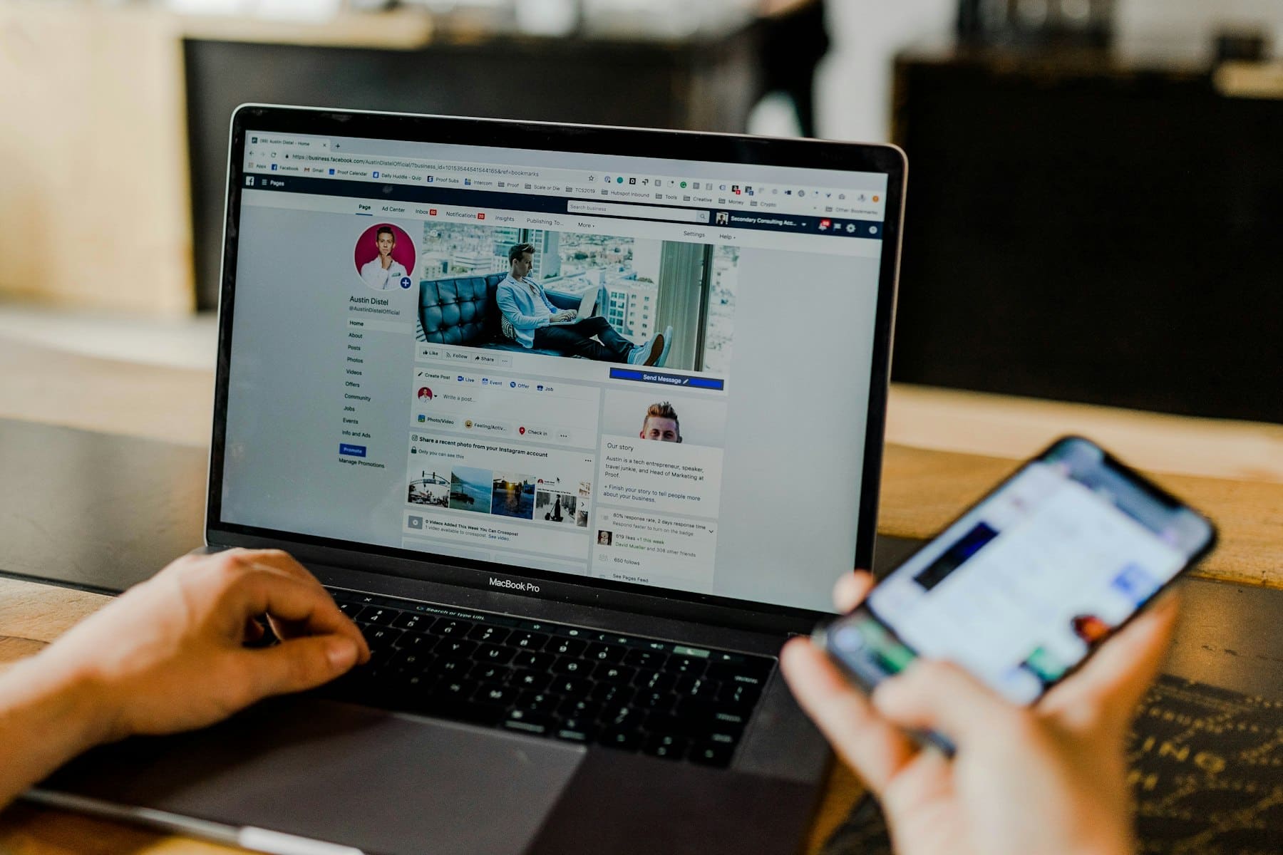 Marketer reviewing social ad performance across laptop and phone